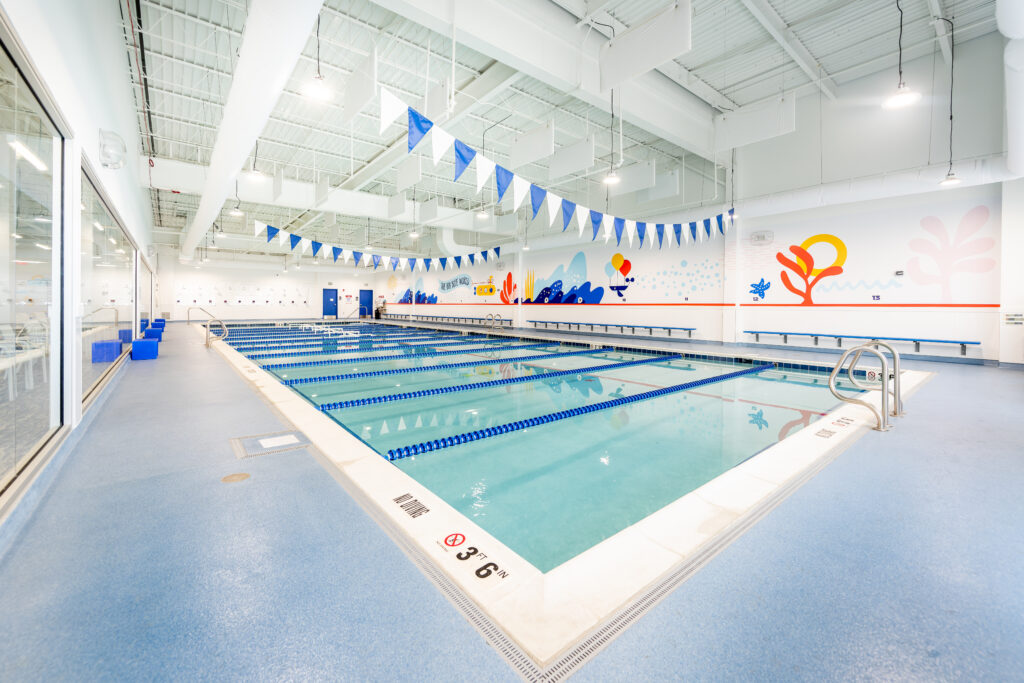 Big Blue Swim School has become a popular big-box anchor in shopping centers throughout America. Shown in this article about Medtail and Edutail retailers, is a photo of a typical interior of a Big Blue franchise situated in a suburban community center. Photo: Courtesy of Big Blue Swim School