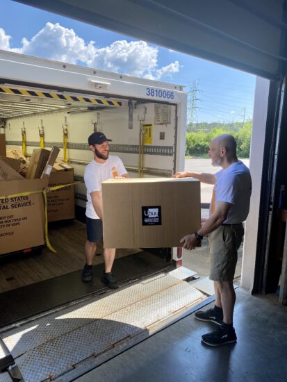 image of delivery truck with Ubuy package